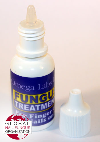 Close up of Omega Labs Fungus Treatment Squeeze bottle with lid removed. Printed label is low quality and appears blurry in person.